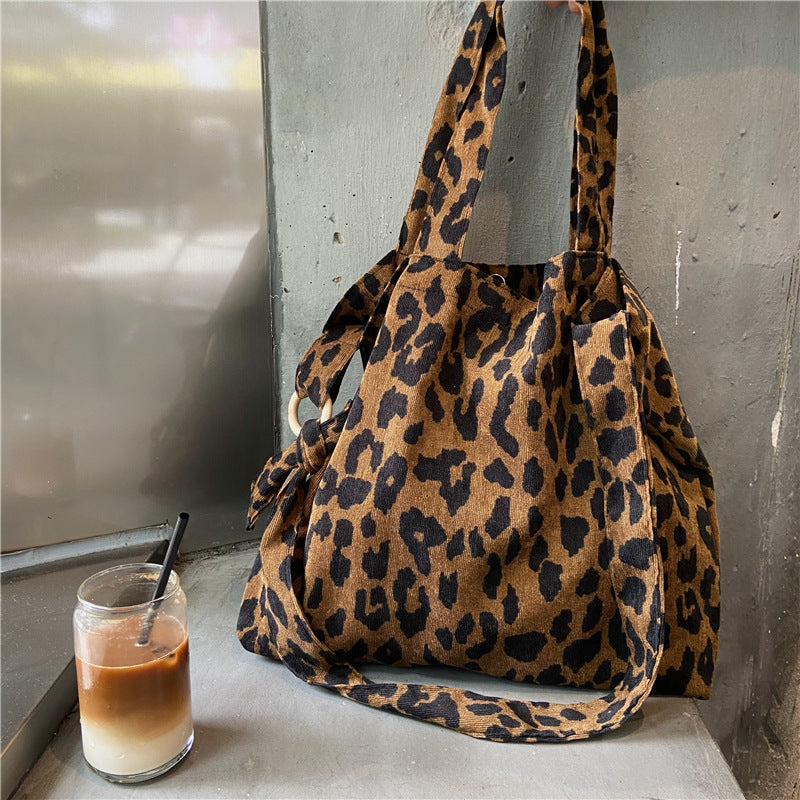Sac messager rétro grande capacité avec motif rose artistique