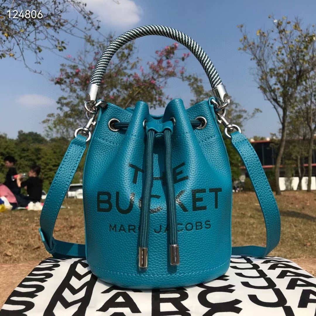 Sac bandoulière en cuir de vachette à cordon de serrage petit sac à main de couleur unie pour femmes