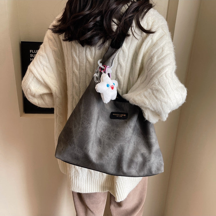 Sac cabas demi-lune en jean et toile avec fermeture éclair