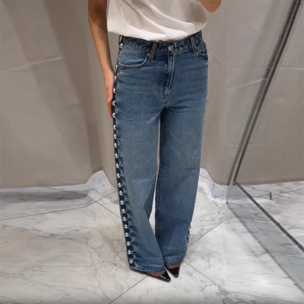 Jeans en jean bleu foncé rétro pour femme avec détails décoratifs de perles rondes sur les côtés