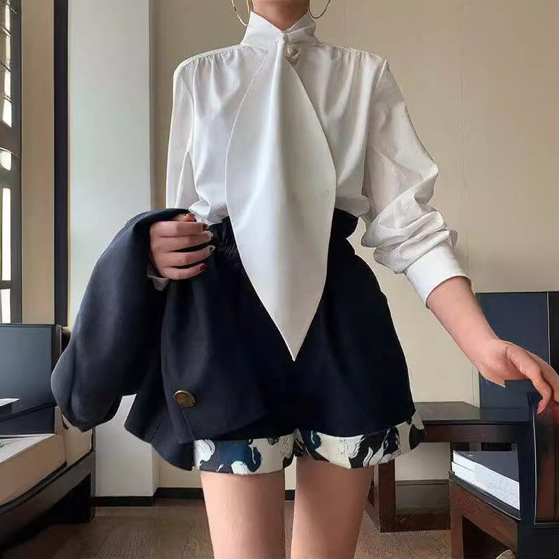 Haut chemise ample à revers et manches longues pour femmes, disponible en blanc, noir et bleu