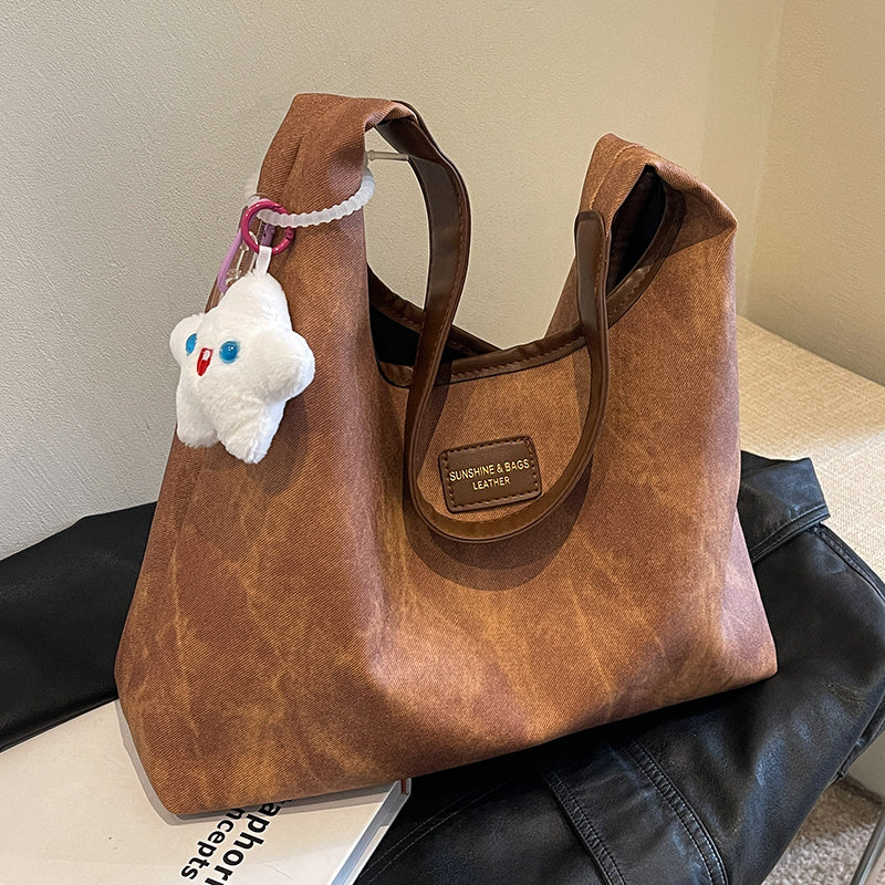 Sac cabas demi-lune en jean et toile avec fermeture éclair