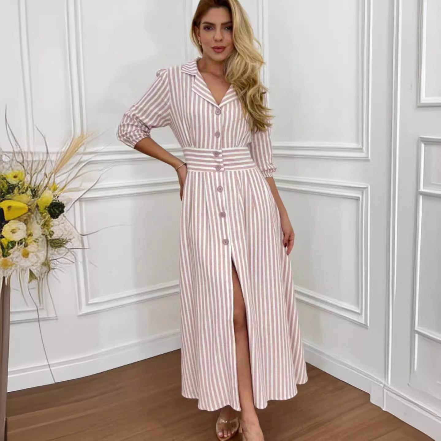 Élégante chemise longue rayée de style européen et américain avec une touche de tempérament