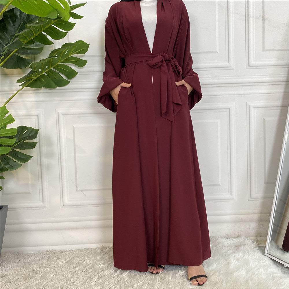 روب كارديجان بأربطة مع أساور وأزرار وجيوب للنساء في الشرق الأوسط