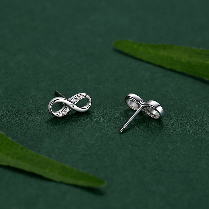 Boucles d'oreilles clous en argent sterling 925 avec nœud et zircon