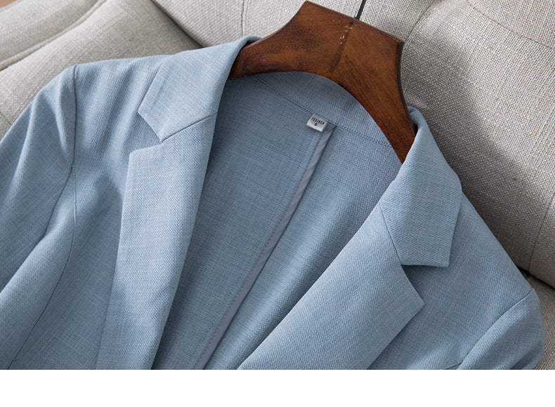 Veste de tailleur femme coupe ajustée avec manches trois-quarts et col de costume