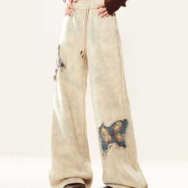 Pantalon en jean évasé abricot brodé papillon américain pour femme