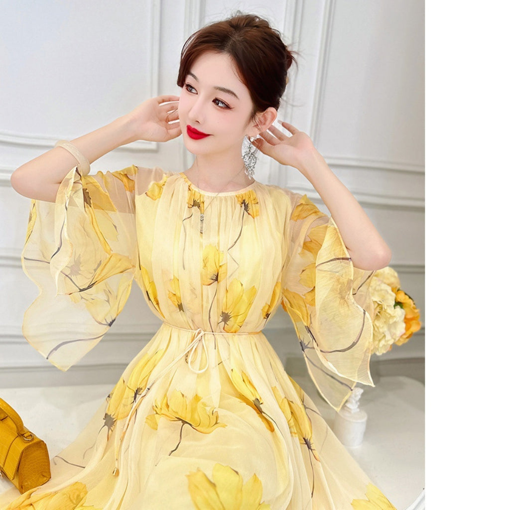 Robe en mousseline française fluide et polyvalente à motif floral jaune pour femme