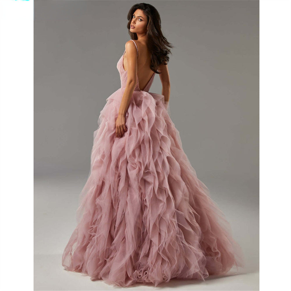 Robe longue de soirée/bal en maille rose avec bretelles fines et ourlet irrégulier