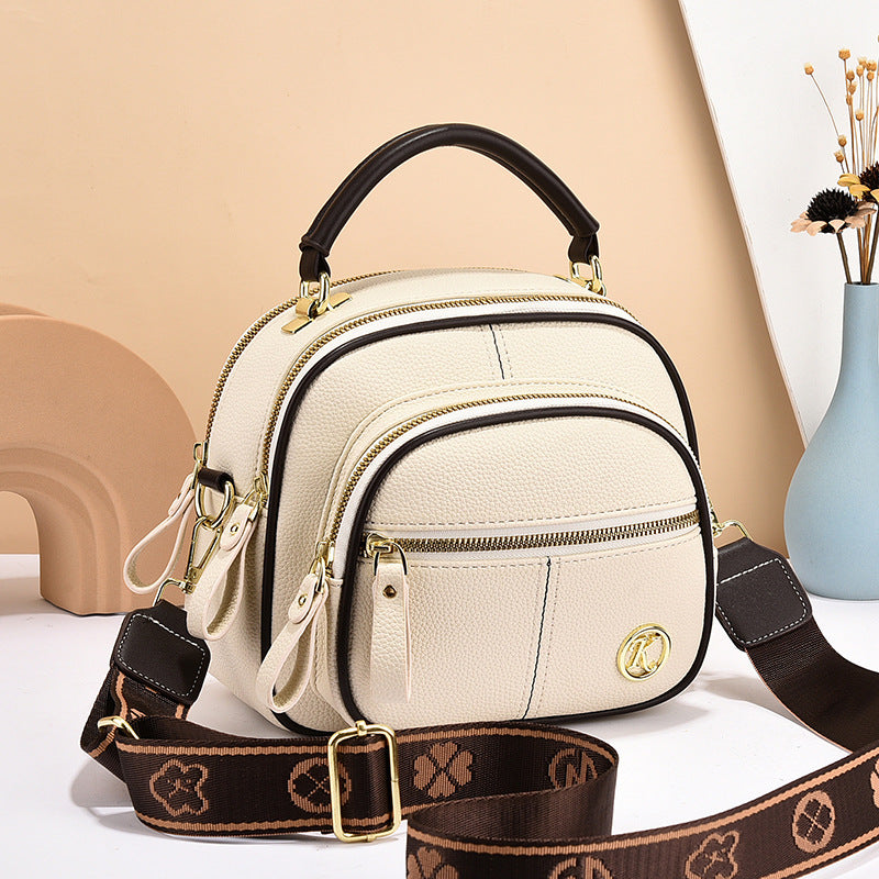 Sac bandoulière carré polyvalent pour femme avec plusieurs fermetures éclair et une bandoulière