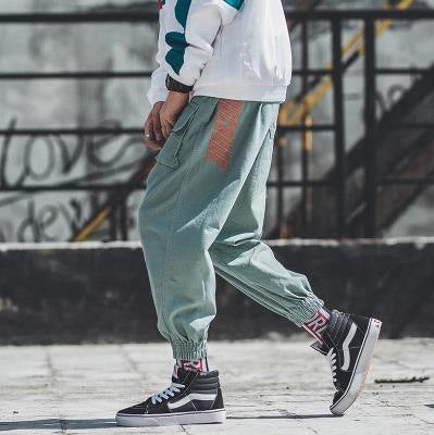 Men's Strapped Feet Street Trend Loose Style Nine-point Harlan Pants