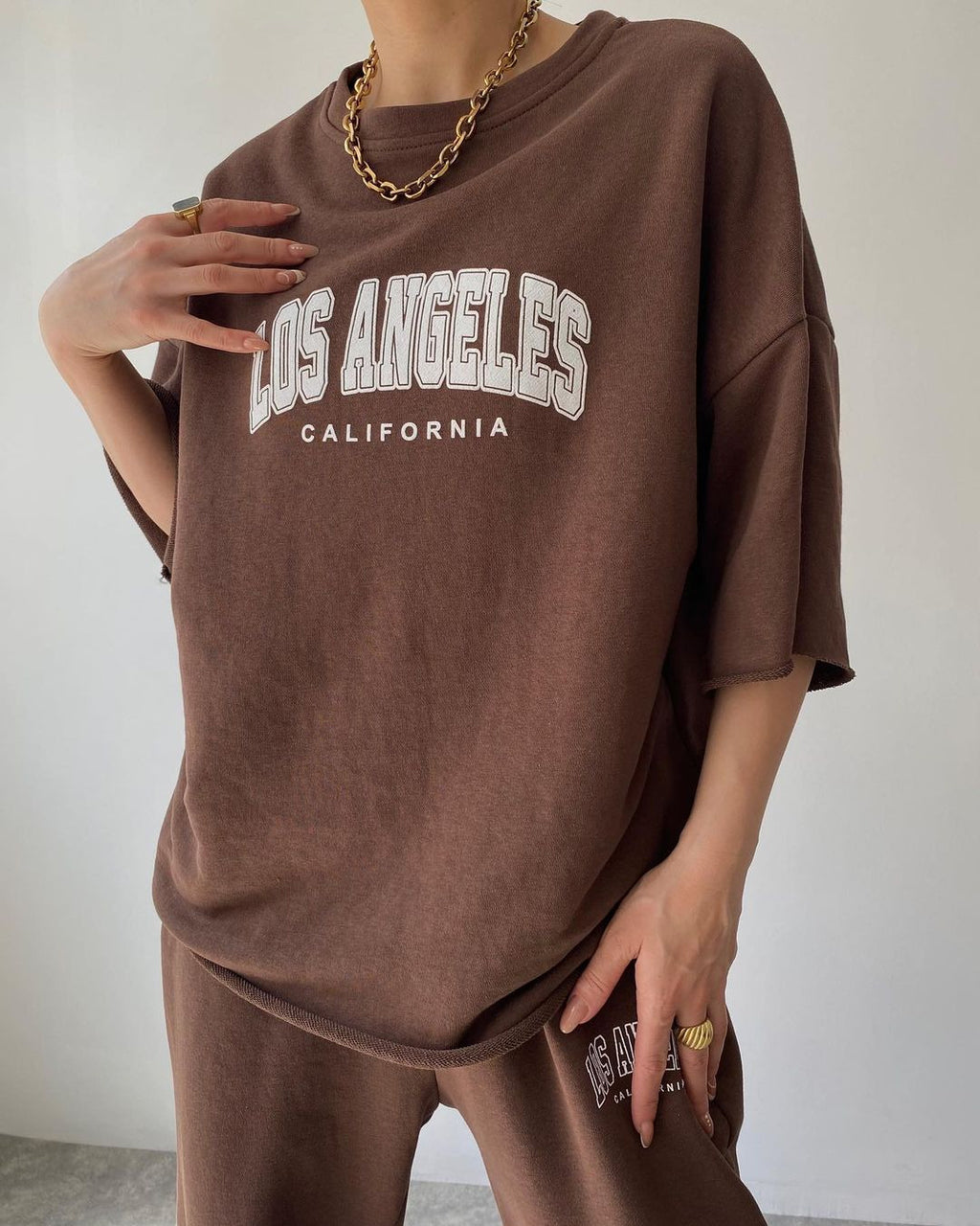 Ensemble deux pièces sweat à capuche imprimé manches courtes et pantalon pour femme