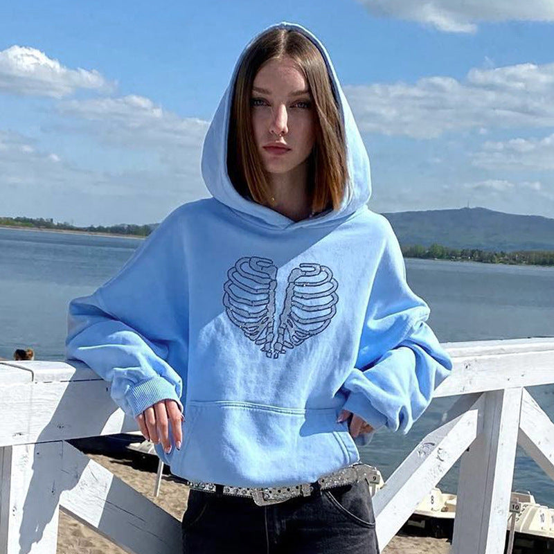 Pull à capuche ample avec strass motif squelette