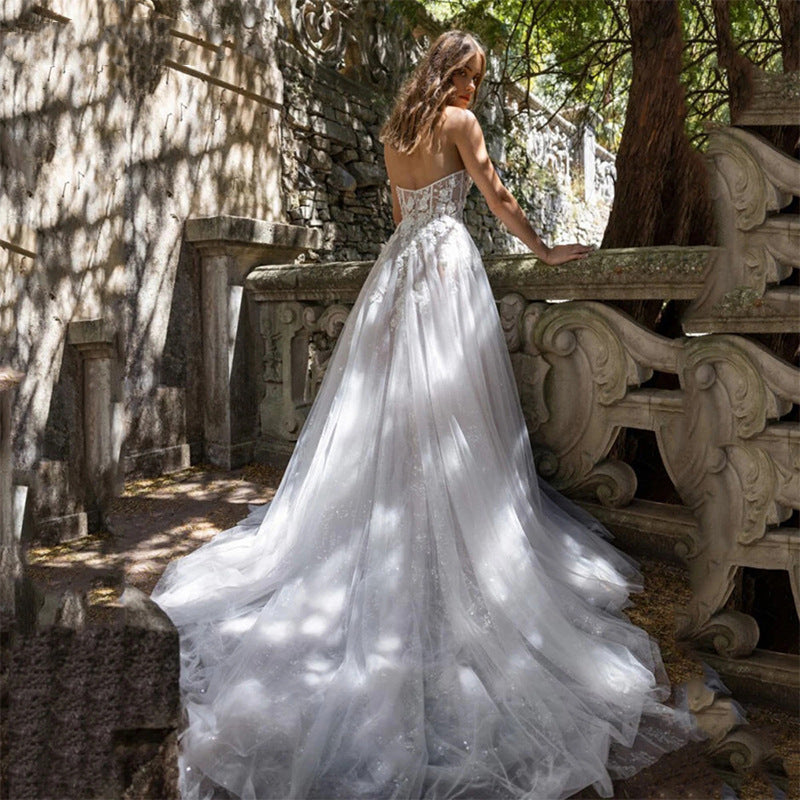 Robe de mariée bustier transparente blanc ivoire pour femme avec fente haute et dentelle