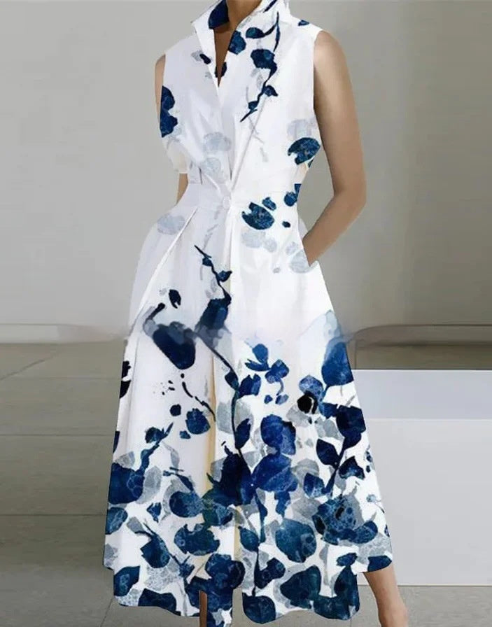 Robe mi-longue en coton à col montant, taille cintrée et imprimé poche