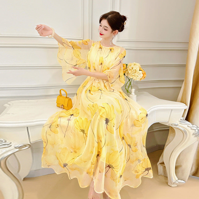 Robe en mousseline française fluide et polyvalente à motif floral jaune pour femme