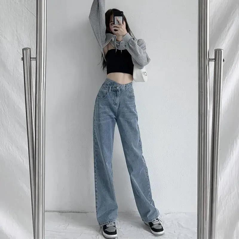 Pantalon en jean coupe droite ajustée avec design irrégulier drapé longueur ras du sol