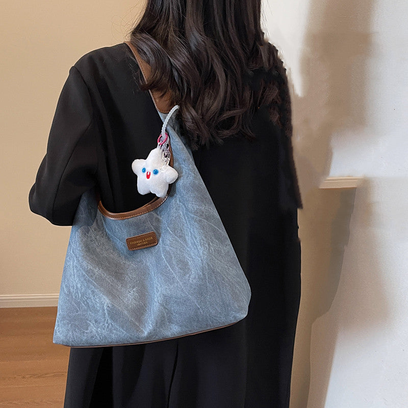 Sac cabas demi-lune en jean et toile avec fermeture éclair