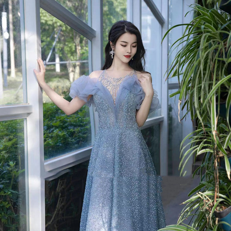 Robe de soirée en gaze légère bleu saphir perlée pour femme