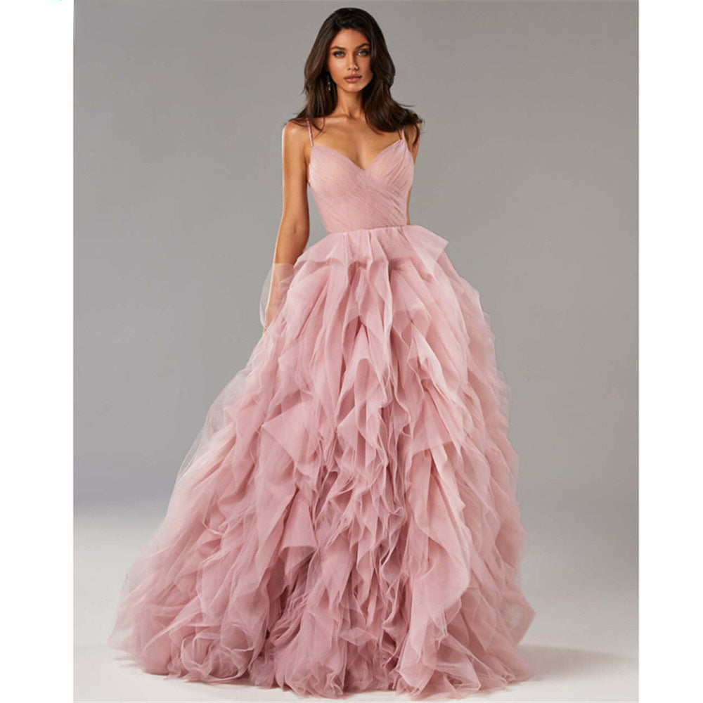 Robe longue de soirée/bal en maille rose avec bretelles fines et ourlet irrégulier