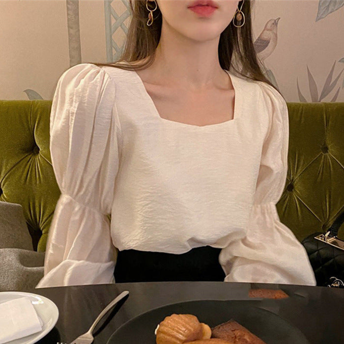 بلوزة مخططة بأكمام منفوخة للنساء، قميص يعطي مظهراً أصغر سناً