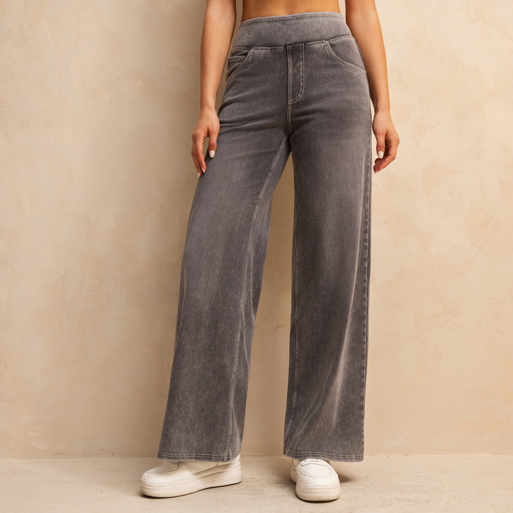 بنطلون جينز نسائي فضفاض بخصر عالٍ ولون رمادي فاتح متوسط