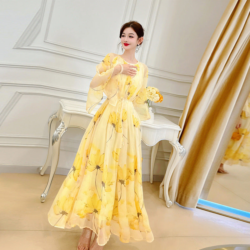 Robe en mousseline française fluide et polyvalente à motif floral jaune pour femme