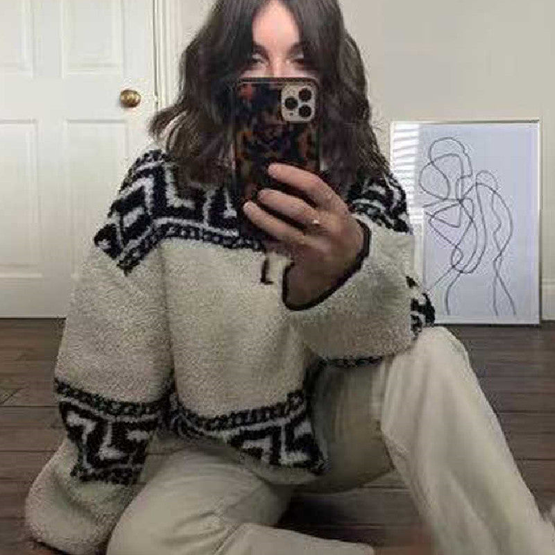 معطف صوفي فضفاض من صوف الحملان، بياقة عريضة وياقة قصيرة وسحاب قصير