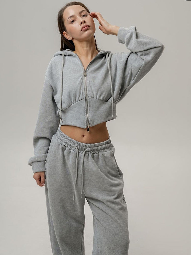 Ensemble deux pièces pull à capuche zippé à manches longues et pantalon à lacets uni