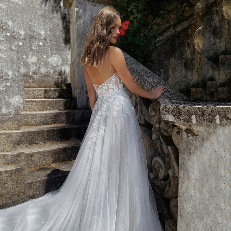 Robe de mariée bustier transparente blanc ivoire pour femme avec fente haute et dentelle