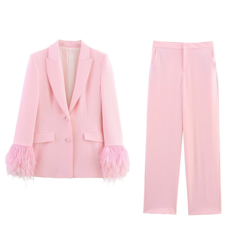 Ensemble élégant veste de costume avec poignets et pantalon droit