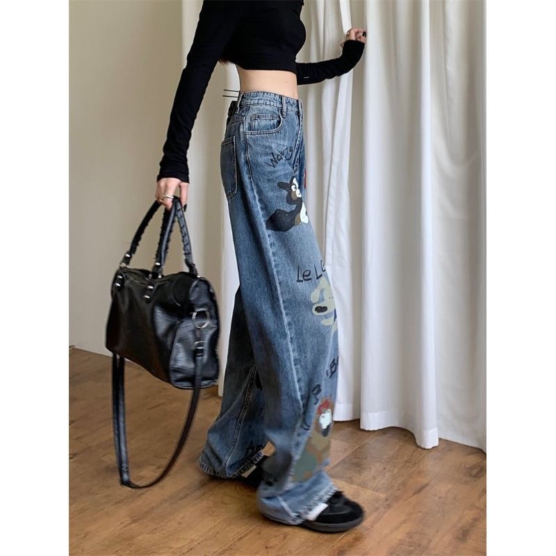 Jean taille haute en jean bleu avec graffitis style rétro américain pour femmes