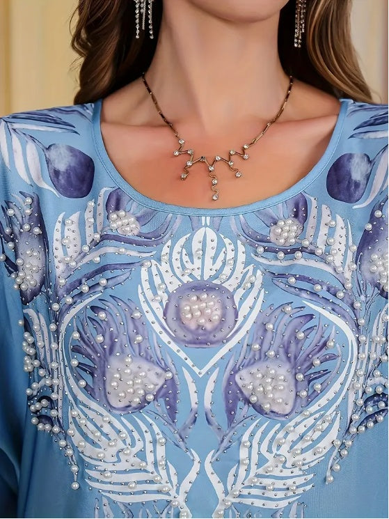 فستان عباية أنيق بأكمام طويلة وطبعة زهور، يتميز بنقشة زهور أنيقة.