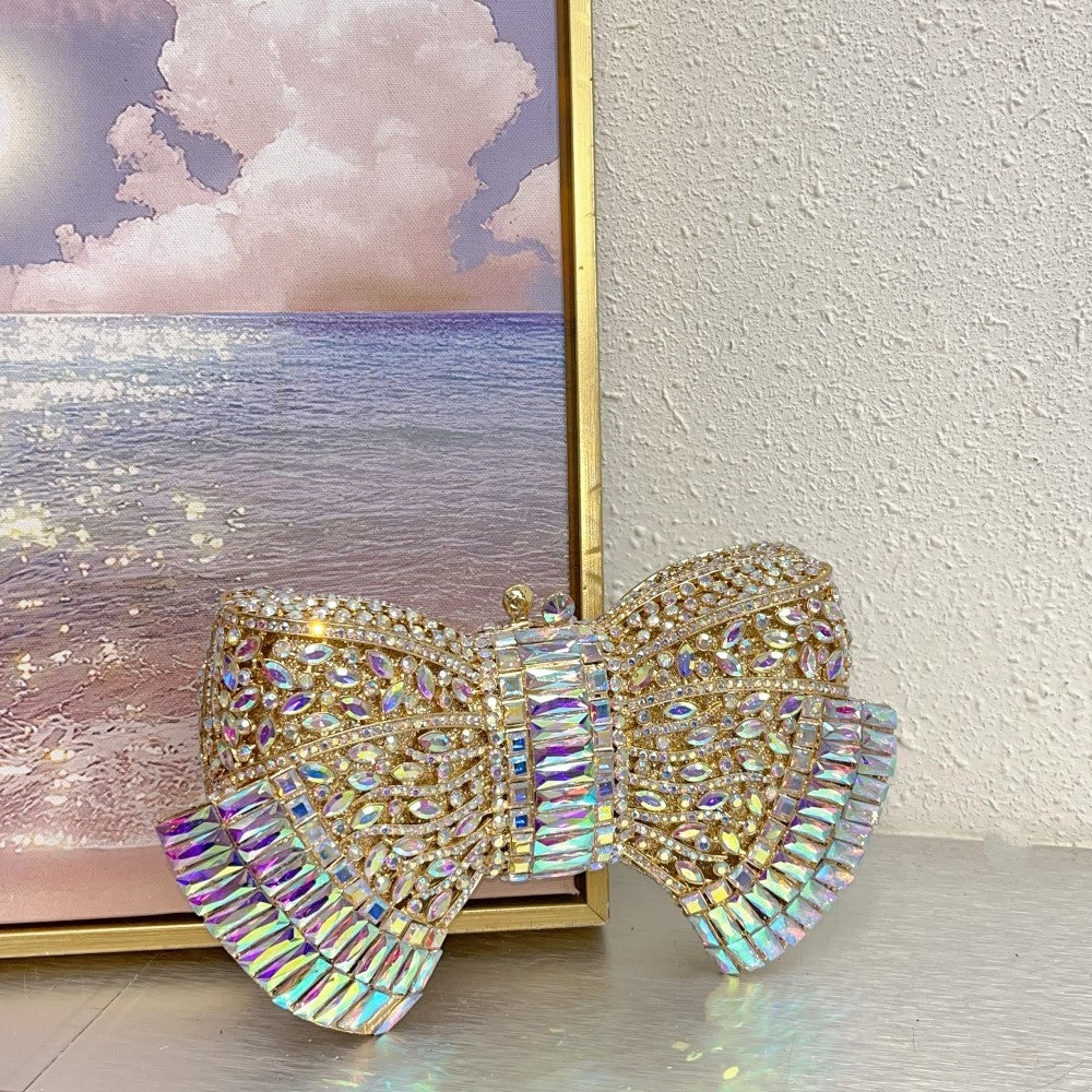 Sac bandoulière pochette en métal avec nœud et accents diamantés