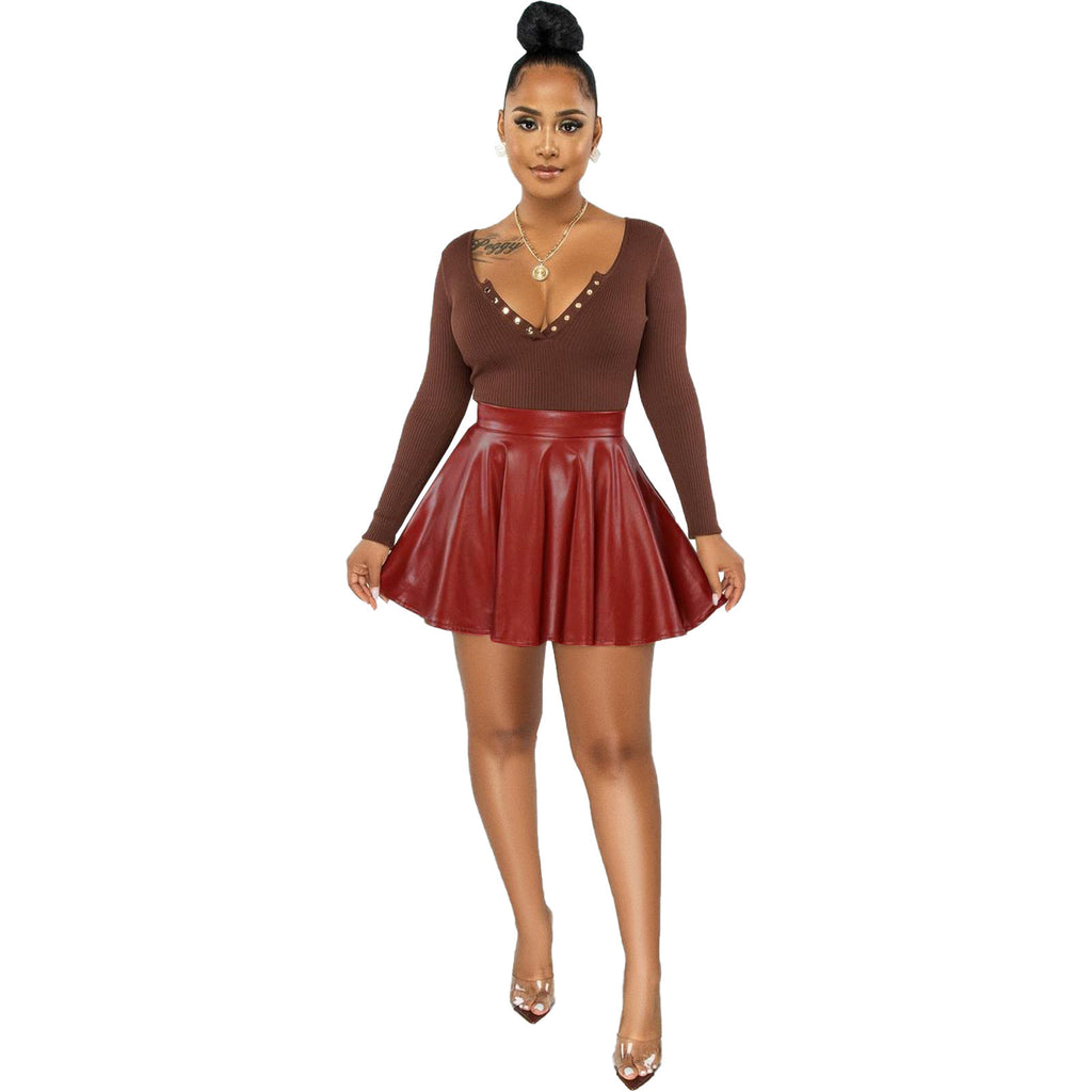 Jupe plissée sexy pour femme en similicuir PU de couleur unie