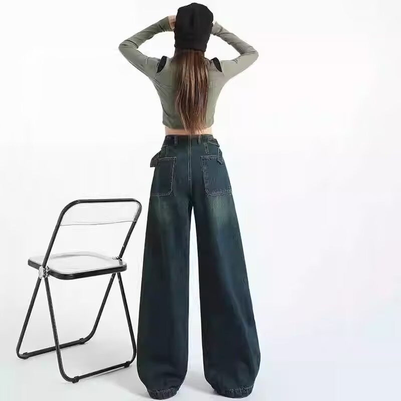 بنطلون جينز أمريكي قديم واسع الساق بخصر عالٍ وبتصميم نحيف مع إبزيم حزام ممزق