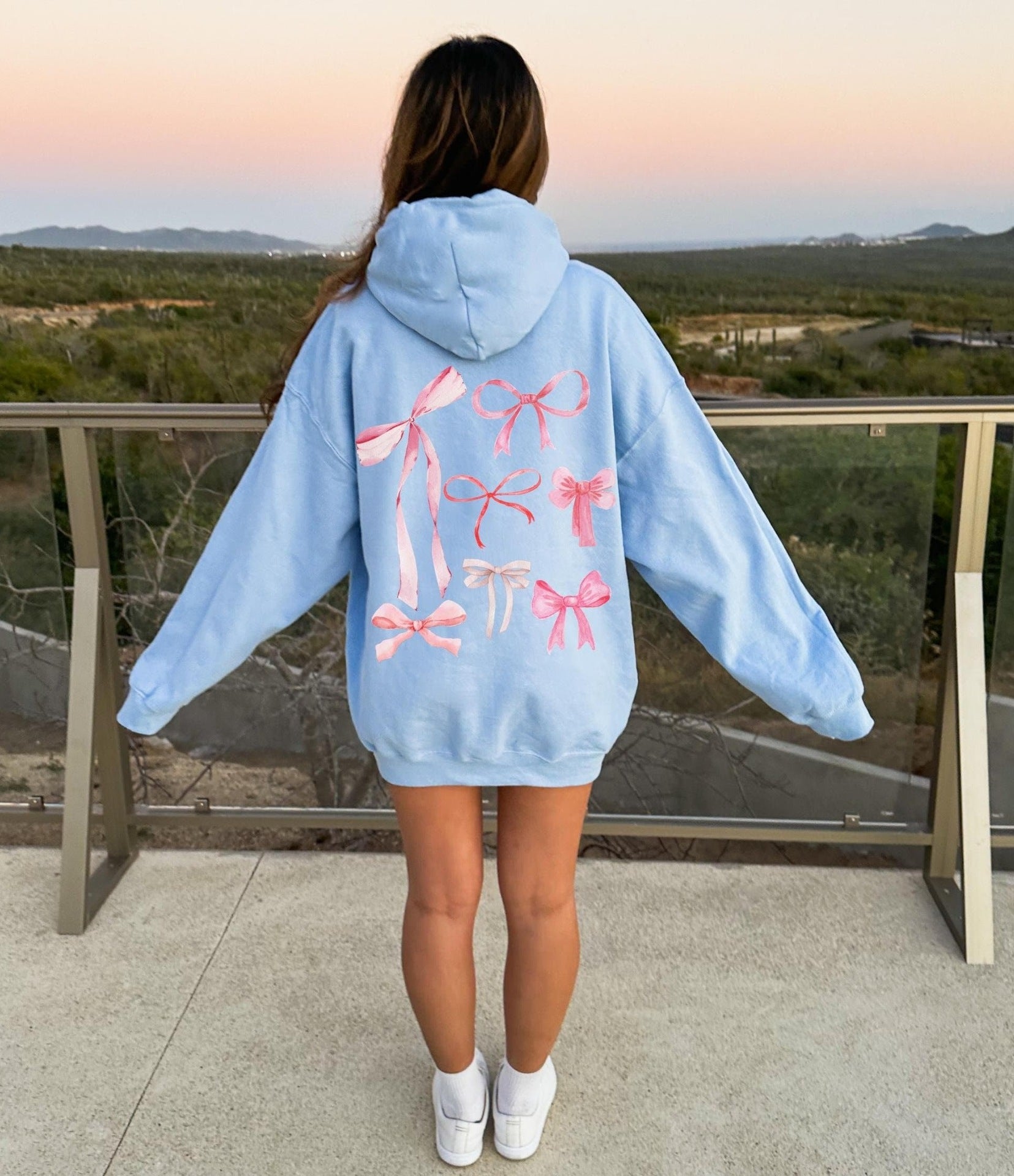 Pull à capuche à épaules tombantes pour femme
