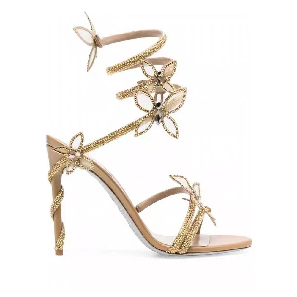 صندل روماني بكعب ستيليتو مزين بزهرة مرصعة بأحجار الراين على شكل ثعبان وفراشة