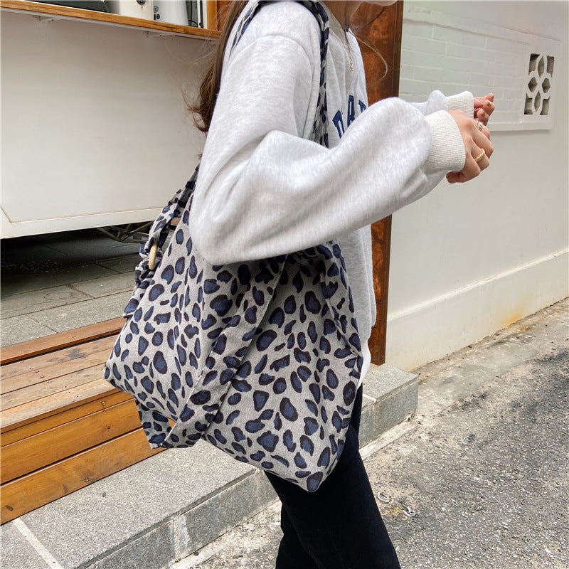 Sac messager rétro grande capacité avec motif rose artistique