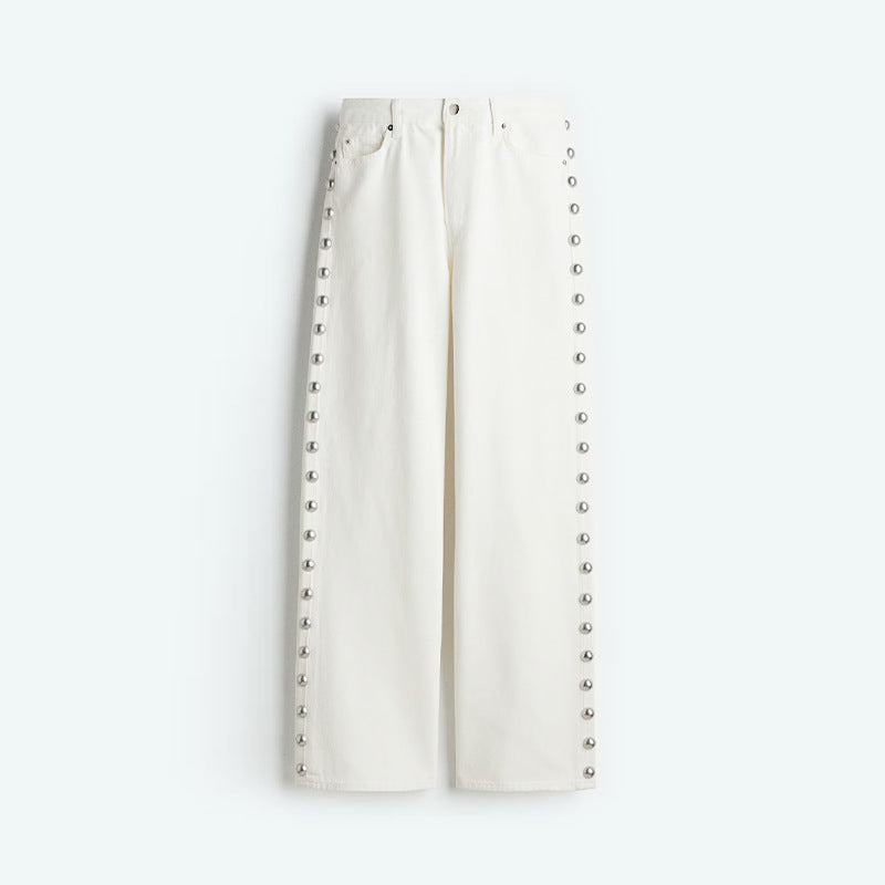 Jeans en jean bleu foncé rétro pour femme avec détails décoratifs de perles rondes sur les côtés