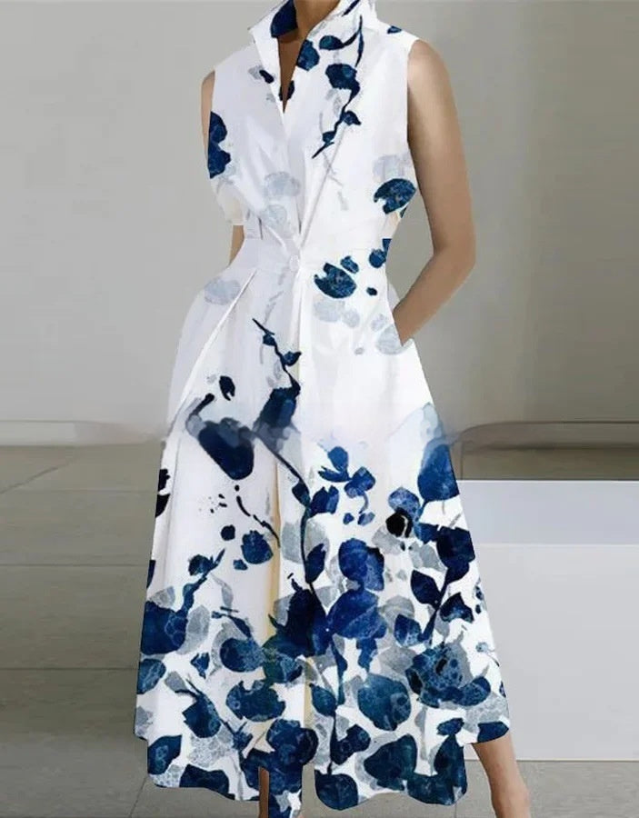 Robe mi-longue en coton à col montant, taille cintrée et imprimé poche